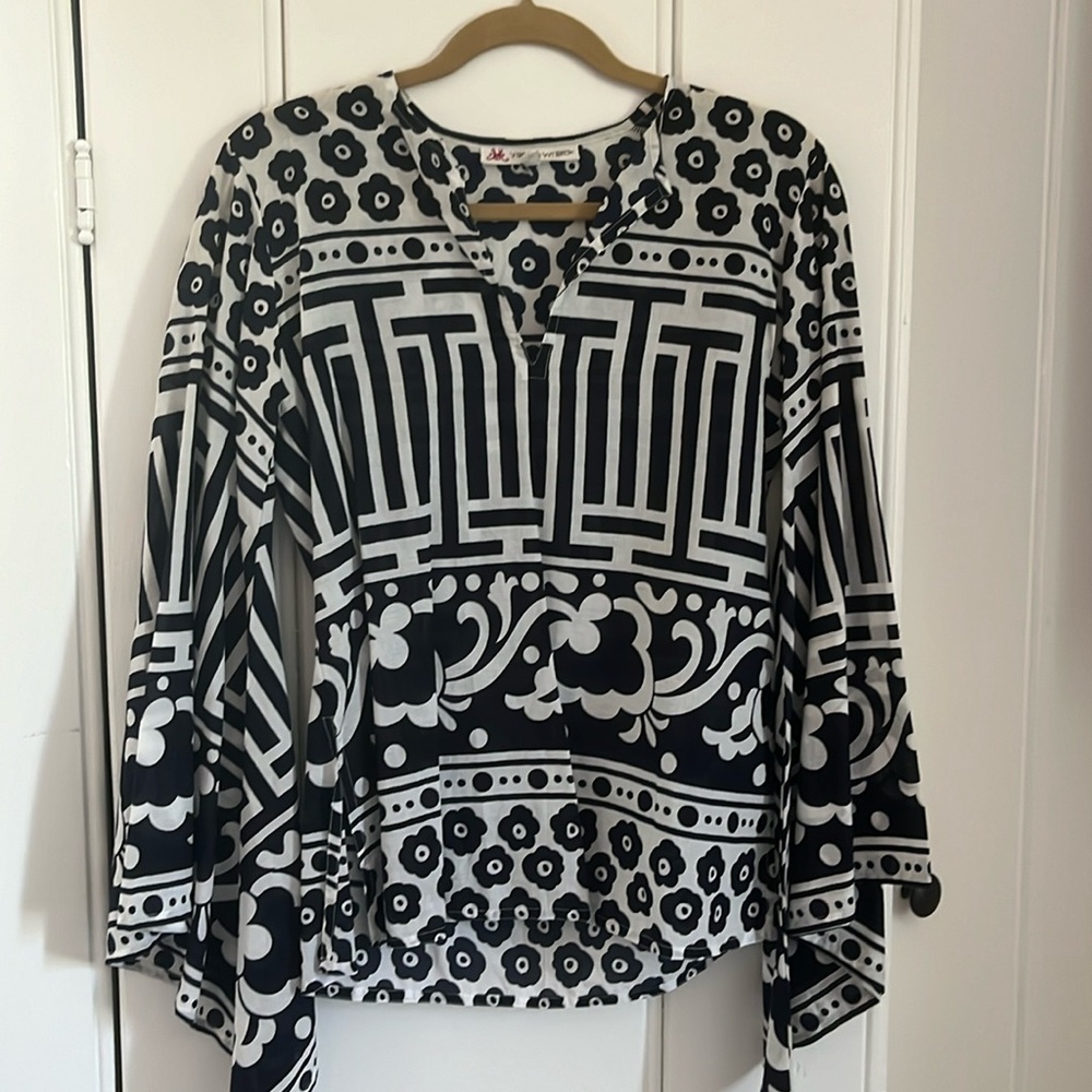 Beautiful tunic I thought in a boutique.